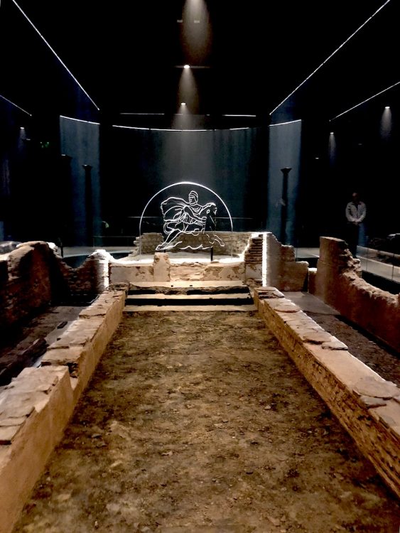 Inside the reconstructed temple of Mithraeum where visitors experience a light and sound demonstration. Photo by Sandra Alvarez.